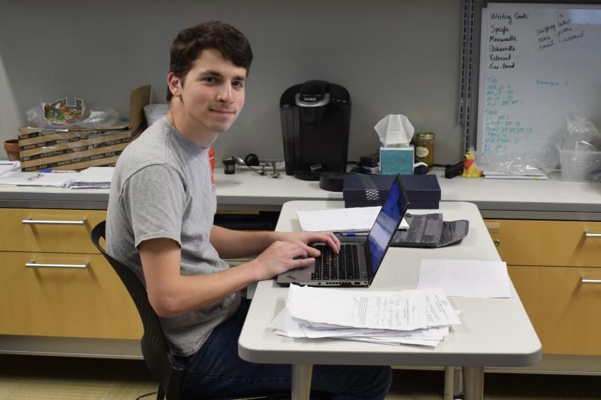David reviewing chain of custody forms for our waterfowl contaminant research project.